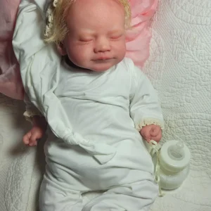 Vinyl Doll with Cloth Body.